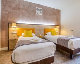 Hôtel Saint Albert - סרלה לה-קאנדה - חדר שינה