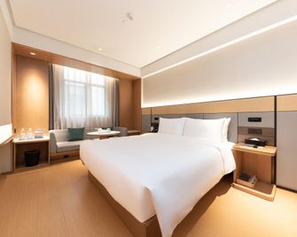 Ji Hotel (Nanjing Pukou Hongyang Plaza Store) - Nanjing - Bedroom