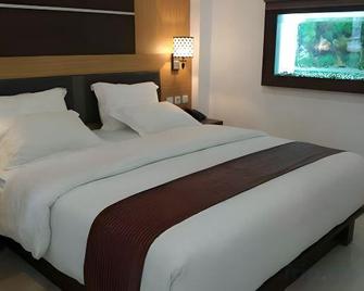 Alibaba Hotel - Pangkalanbuun - Bedroom