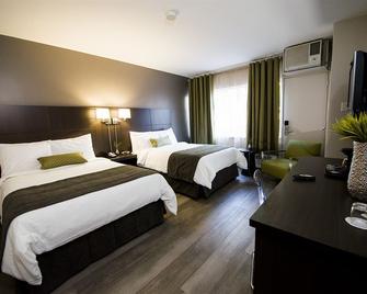 V Hotel & Suites - Moncton - Schlafzimmer