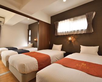 Condominium L's Inn - Naha - Habitación