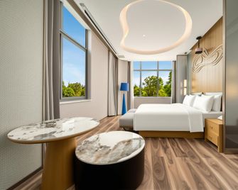 Green 19 Hotel (Nanyang Bridge Water Sports Center Branch) - Наньян - Спальня