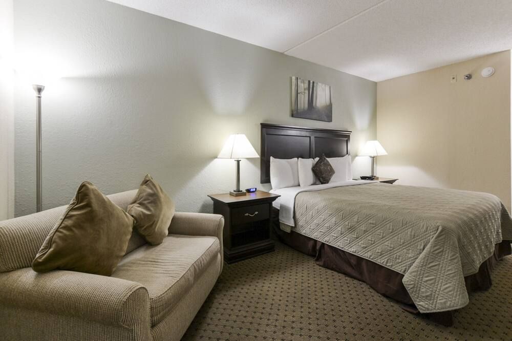 Grand View Inn & Suites - ברנסון - חדר שינה