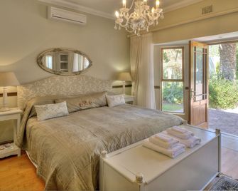 Berluda Farmhouse & Cottages - אודטשורן - חדר שינה