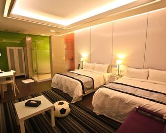 King Motel - Taoyuan City - Schlafzimmer
