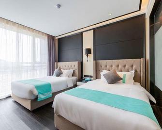 Xana Hotelle (Zouping Huangshan 1st Road) - Binzhou - Bedroom