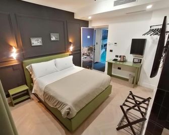 Hotel Xbusiness - Nola - Ložnice