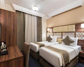 Golden Tulip Al-Zahabi - מדינה - חדר שינה