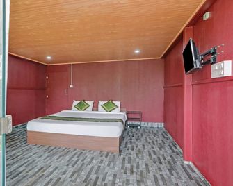 Itsy Hotels Jammabane Cottage - מדיקרי - חדר שינה