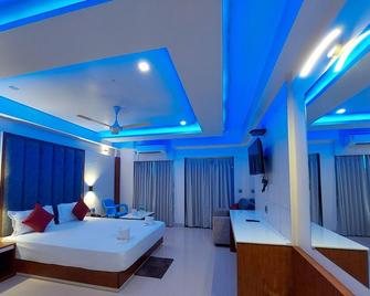 Royal Gitanjali Resort & Spa - Mandarmani - Schlafzimmer