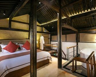 Xiananshan Village Hotel - Lishui - Спальня