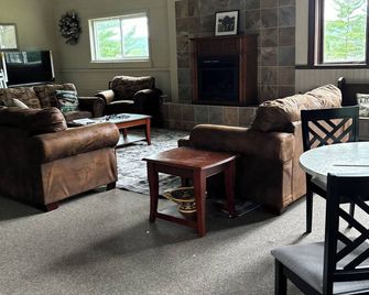 Charming Church in East Jordan ,3 bedrooms ,WiFi, pool-table and gas fireplace. - East Jordan - Living room