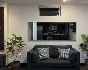 The Lux Den Speaks for itself. Cozy, bright self-contained basement suite - Yorkton - Living room