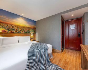 Hengchao Holiday Hotel - Cantón - Habitación