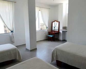 Gallardos Suite - Puerto Ayora - Bedroom