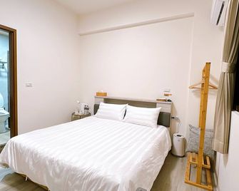 Hidden Villa - Pingtung City - Slaapkamer