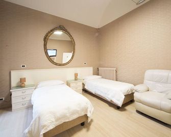 هوتل جلوبو سويت - San Remo - غرفة نوم