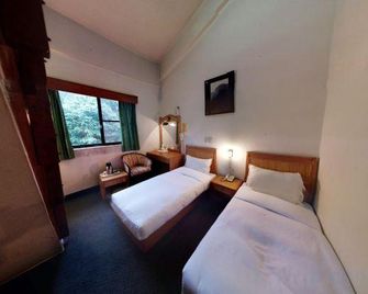 Alishan Gou Hotel - Alishan Township - Bedroom