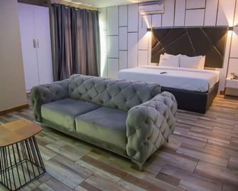 Tnk 호텔 - 에누구 - 침실