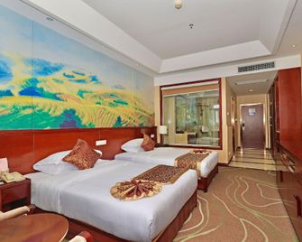Huamei International Hotel (Longsheng Bus Station Store) - Guilin - Schlafzimmer