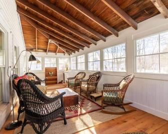 This house is a 2 bedroom(s), 2.5 bathrooms, located in Manchester, VT. - Manchester - Living room