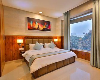 Clay Inn Hotel, Sohna Road, Sector 49, Gurugram - Gurugram - Yatak Odası