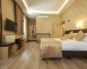 Payidar Hotel - Amasya - Slaapkamer