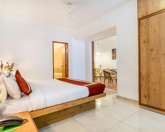 Octave Hotel - Double Rd - Bengaluru - Bedroom