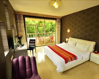 Ctn Li River Hotel - Guilin - Schlafzimmer