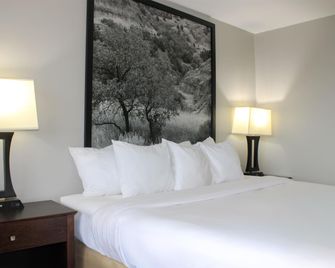Super 8 by Wyndham Williston ND - Williston - Schlafzimmer