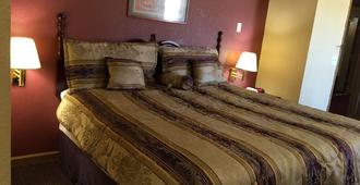 First Western Inn - Fairmont City - Fairmont City - Bedroom