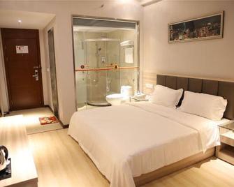 Super 8 Ezhou Wenxing Avenue - E’zhou - Bedroom