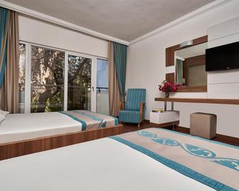 Maya World Hotel Side - Side - Bedroom