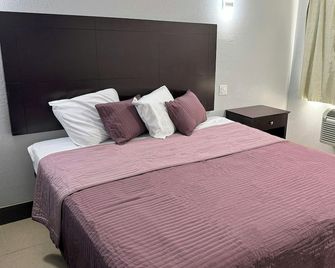 Xpress Inn & Extended Stays - Marshall - Habitación