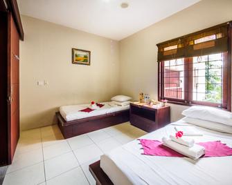 Al-Isha Dharamshala - Kuta - Bedroom