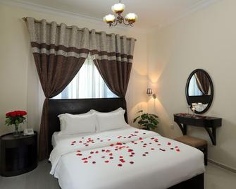 Al Smou Hotel Apartments - Maha Hospitality Group - Ajman - Habitación