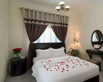 Al Smou Hotel Apartments - Ajman - Bedroom