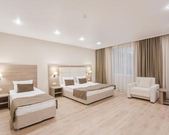Ivmontan Hotel - Estosadok - Schlafzimmer