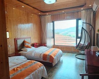 Hongtu Qicai Renjia Hostel - קונמינג - חדר שינה