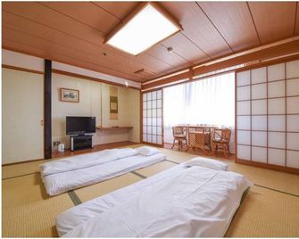 Yao Grand Hotel - Yao - Habitación