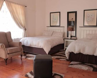 Rose Petals Guest House - איסט לונדון - חדר שינה