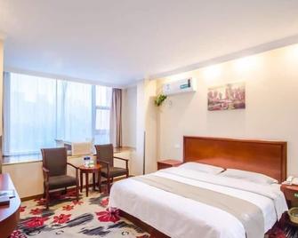 Greentree Inn Jiaxing Zhonghuan South Road Zhonggang City Express Hotel - Jiaxing - Спальня