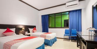 Oyo 329 Hotel Darma Nusantara 2 - Makassar - Bedroom