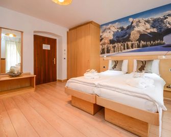 Corona - Pinzolo - Schlafzimmer