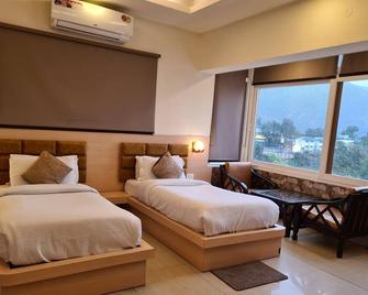 Hotel Rajpur Heights - דהרדון - חדר שינה