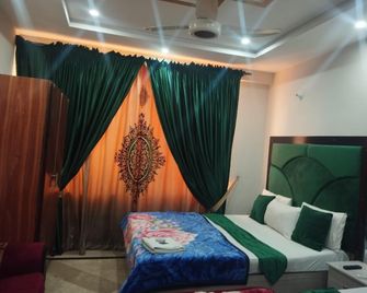 Hotel Royal Grace Lahore - Lahore - Slaapkamer
