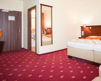 Hotel Medaillon - מגדבורג - חדר שינה