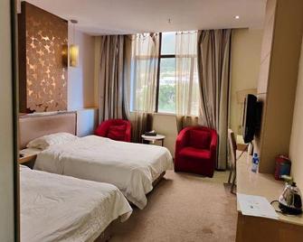 Beiyuan Fashion Hotel - Zhaoqing - Bedroom