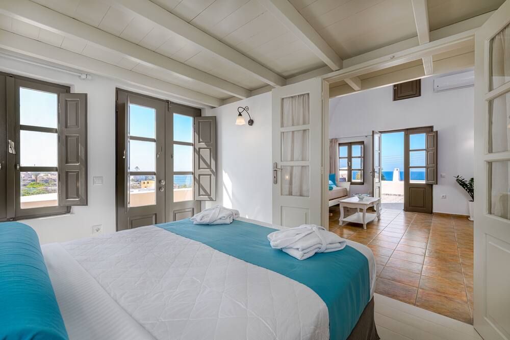En Plo Boutique Suites - אויה - חדר שינה