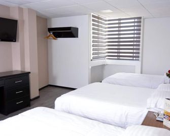 Hotel Italia Cuenca - Cuenca - Schlafzimmer